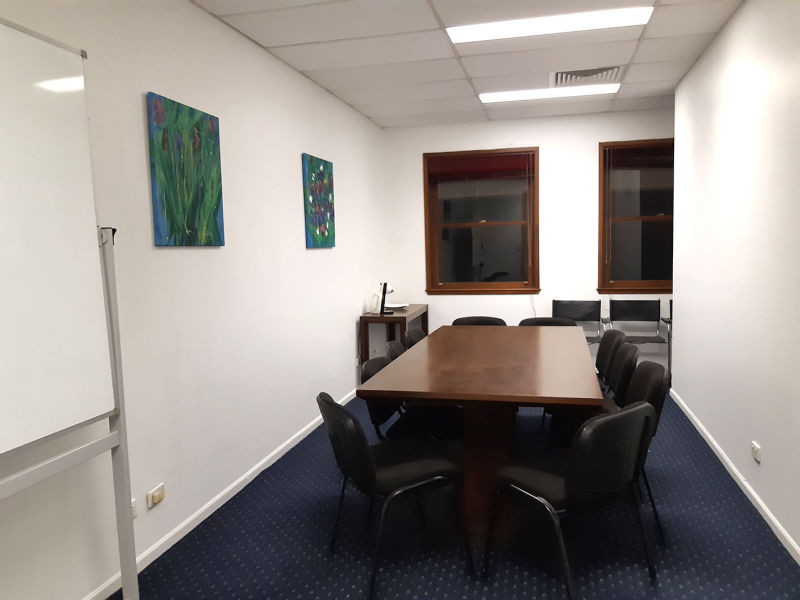 Board room seats 8-10 people